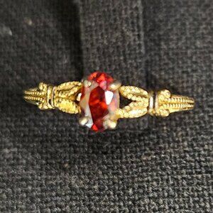 Gold tone orange rhinestone ring